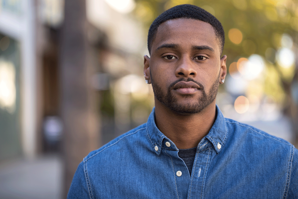 man with a beard looks forward while wondering about mississippi substance abuse statistics