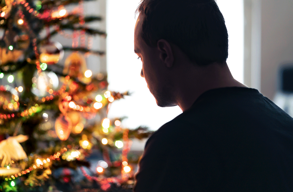 Man thinking about ways to deal with PTSD during the holidays