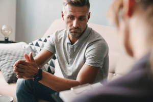 A man learning about treating substance abuse with CBT