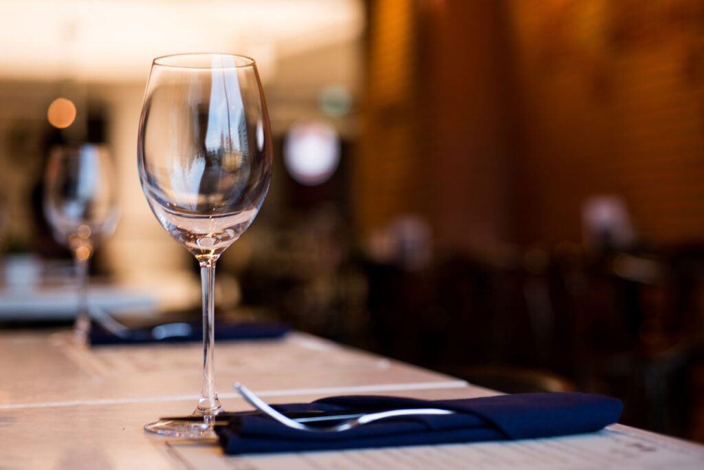 a photo of an empty wine glass could be an indication of alcohol intolerance symptoms