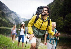 a group of people go on a hike during their experiential therapy programs