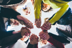 a bunch of people holding hands in support and showing what rehab is like